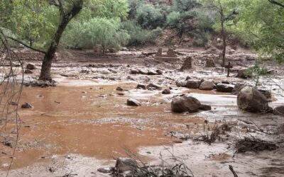 Destroyed Bright Angel Creek footbridge pylons and muddy runoff after the August 29 2026 flood