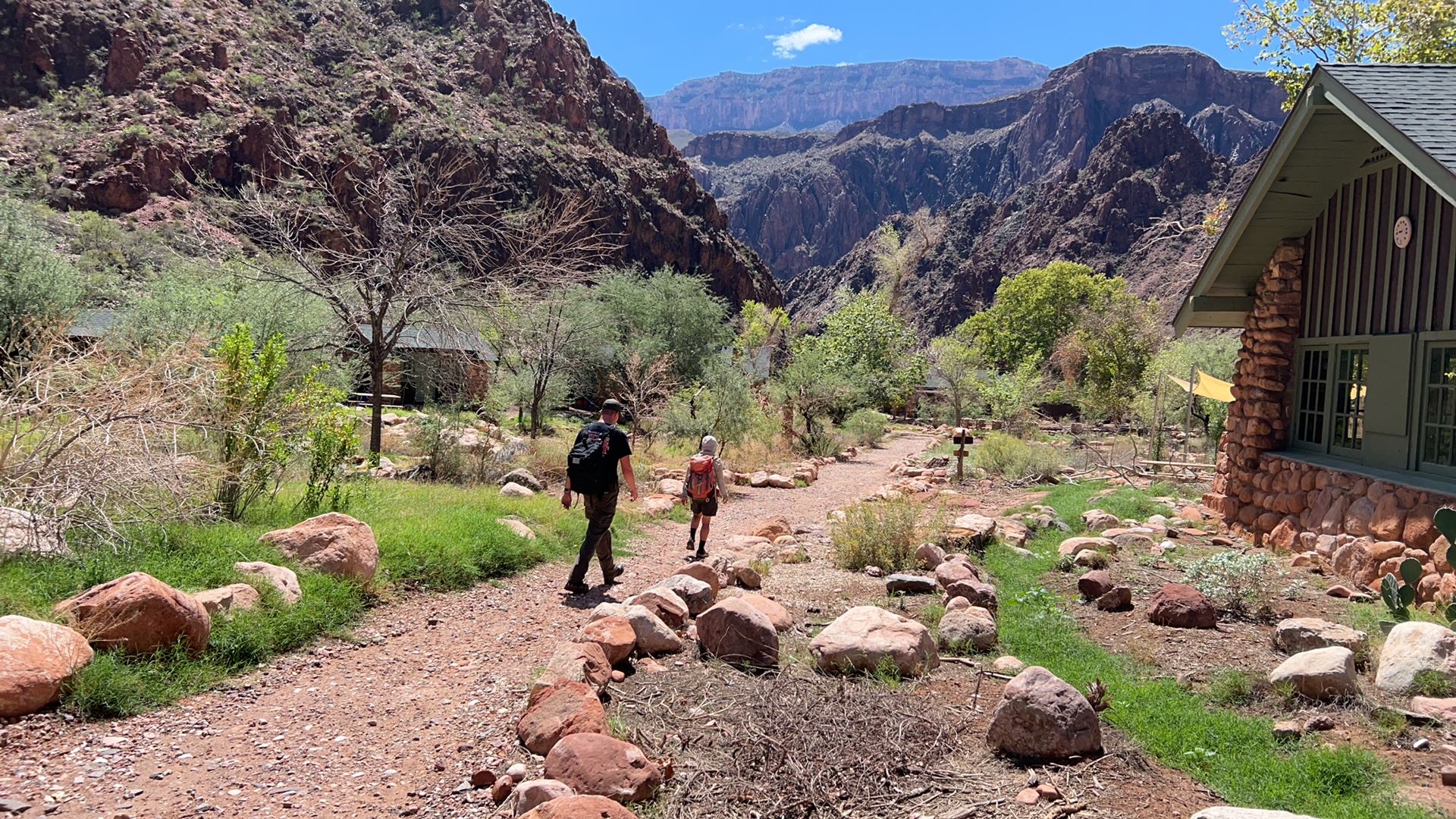 Recovery personnel walking through the Phantom Ranch area following the 2026 flood